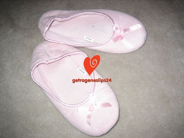 Chice getragene Schuhe in rosa