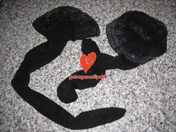 getragene Halterlose Nylon Strümpfe in schwarz mit Fotos